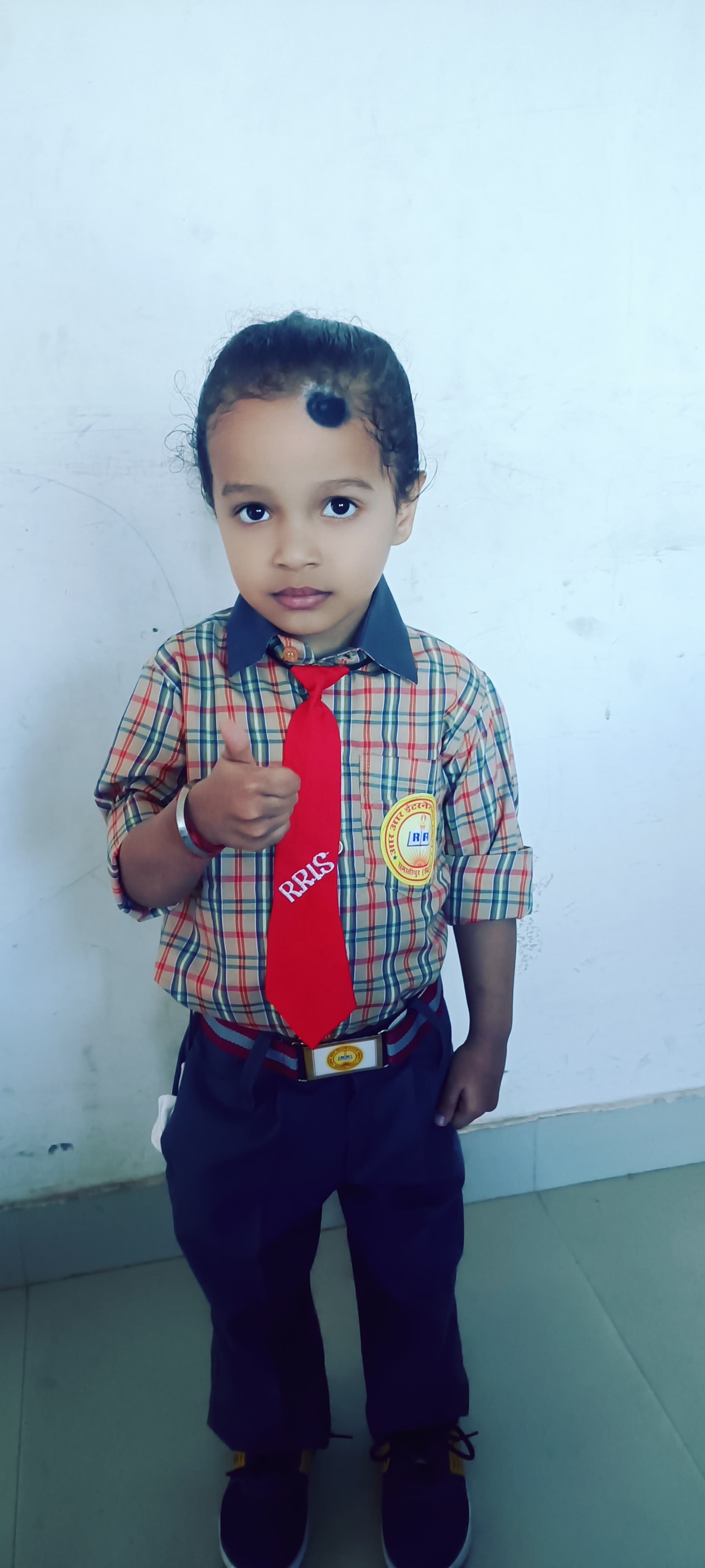 Young student in RR International uniform